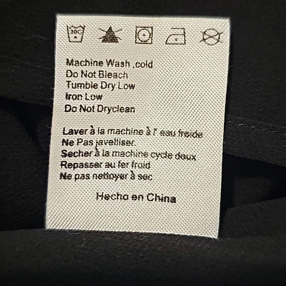 FOXIEDOX by Anthropologie Plisse Tiered Black Cold Shoulder Mini Dress - Picture 6 of 6